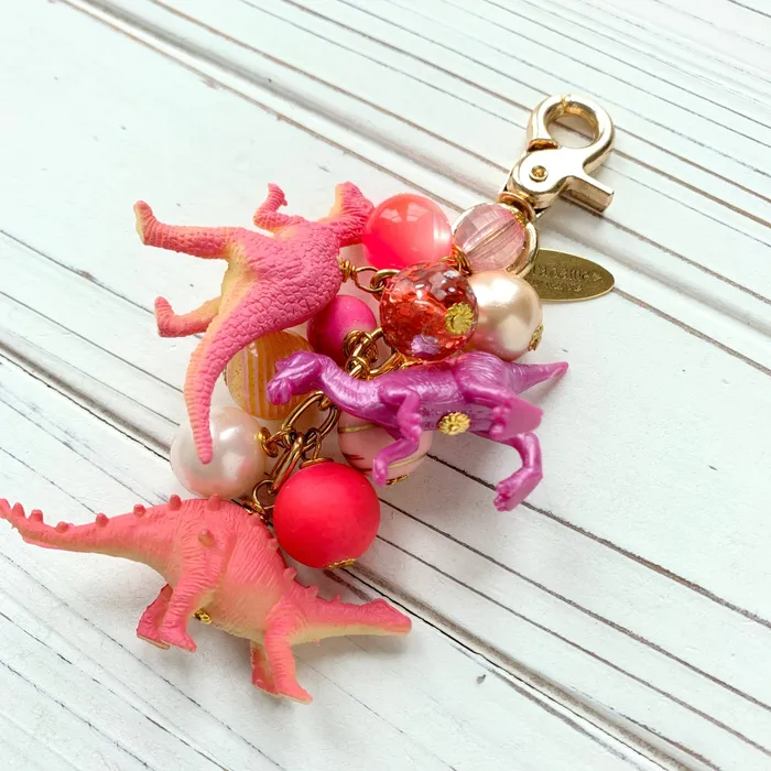 Dinosaur Purse Charm in Taffy Pink Lenora Dame Earrings Dinosaur Purse Charm in Taffy Pink Lenora Dame Earrings
