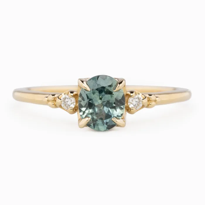 Envero Jewelry Rings Estel Ring 6x5mm 080ct Light Blue Green Oval Montana Sapphire 14K Yellow Gold Envero Jewelry Rings Estel Ring 6x5mm 080ct Light Blue Green Oval Montana Sapphire 14K Yellow Gold