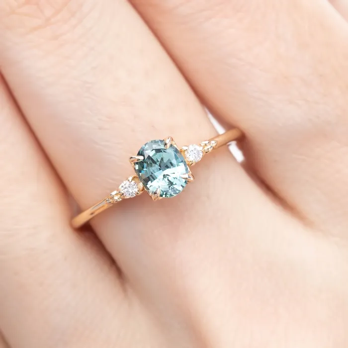 Envero Jewelry Rings Estel Ring 6x5mm 080ct Light Blue Green Oval Montana Sapphire 14K Yellow Gold Envero Jewelry Rings Estel Ring 6x5mm 080ct Light Blue Green Oval Montana Sapphire 14K Yellow Gold