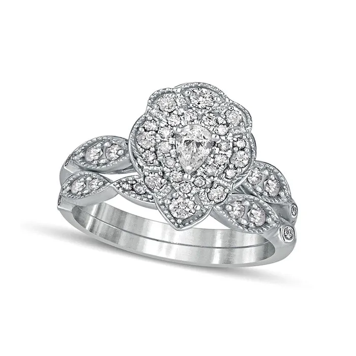Goldia Rings 063 CT TW PearShaped Natural Diamond Double Petal Frame Antique VintageStyle Bridal Engagement Ring Set in Solid 10K White Gold Goldia Rings 063 CT TW PearShaped Natural Diamond Double Petal Frame Antique VintageStyle Bridal Engagement Ring Set in Solid 10K White Gold