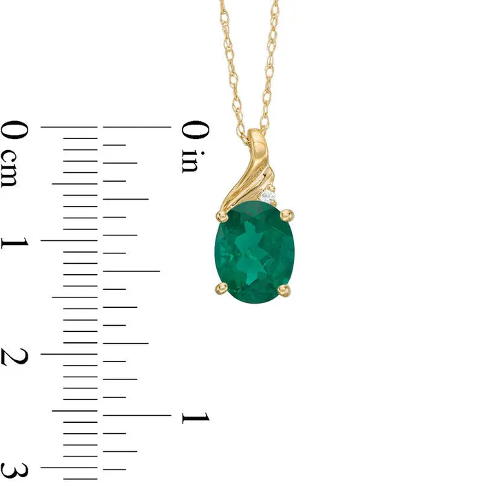 Necklaces Goldia Oval LabCreated Emerald and Diamond Accent Swirl Top Pendant in 10K Yellow Gold Necklaces Goldia Oval LabCreated Emerald and Diamond Accent Swirl Top Pendant in 10K Yellow Gold
