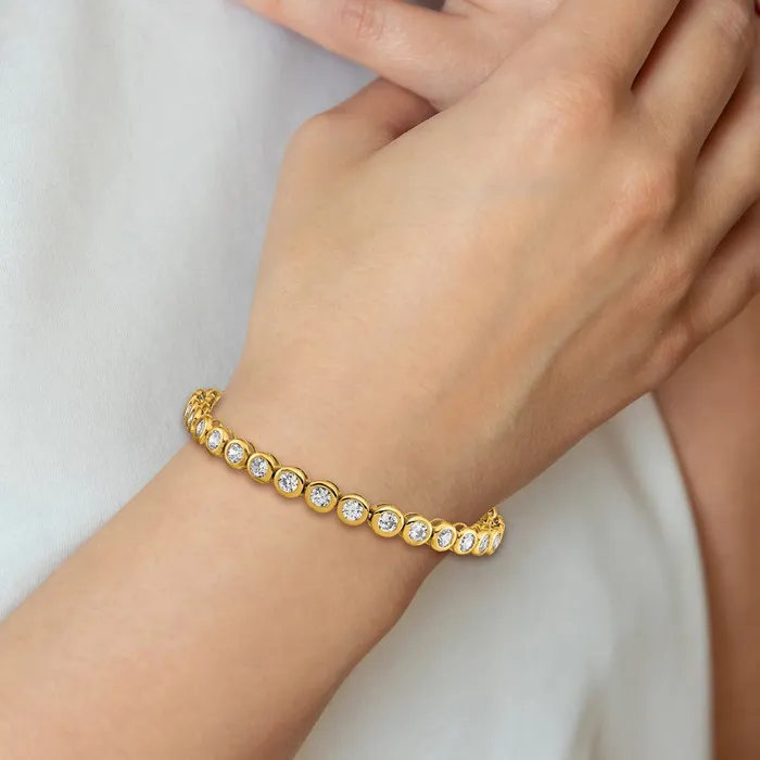Bracelets Chisel Stainless Steel Polished Yellow IPplated Round CZ Link 7 inch Bracelet with 1 inch Extension TreasureFineJewelers